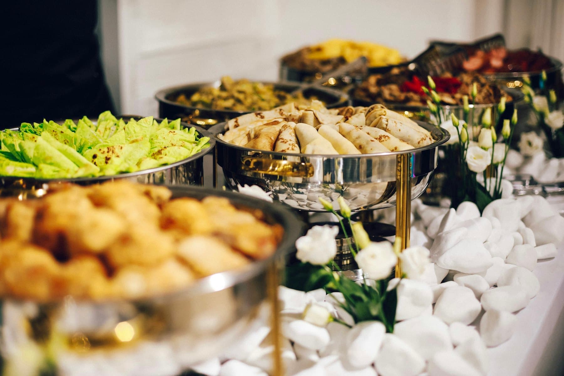 Catering buffet with serving dishes of freshly prepared food